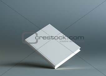 A closed white empty book stands on the corner