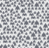Gray irregular geometric seamless pattern with hexagons.