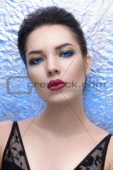 Fashion woman portrait over glossy background