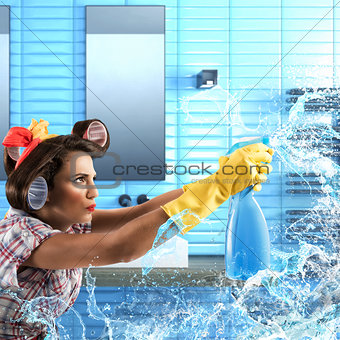 Housewife cleans with soap spray