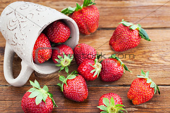 Fresh ripe strawberries in mug