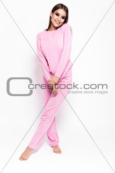 girl in a sports suit on a white background