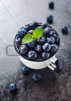 Healthy blueberries in a cup.