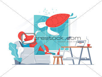 Girl in office with turtle in aquarium