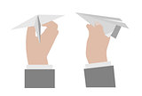 Hand holding a paper airplane.