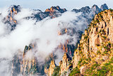Clouds above the colorful peaks of Huangshan National park.