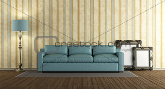 Blue leather sofa in a classic living room