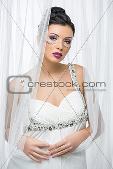 Bride with mask drawn on face