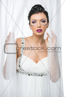 Bride with mask drawn on face