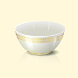 bowl with golden floral ornament and reflection