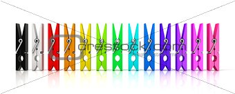 Set of colorful clothes pins. Front view