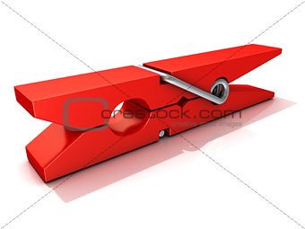 Red plastic clothes pin. Closed