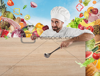 Chef with board and vegetables background