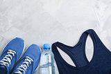 Flatlay sport composition with sport equipment outfit.