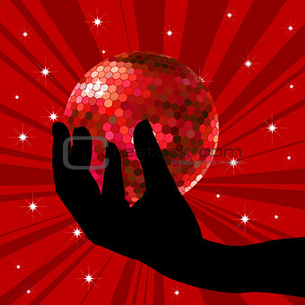 Hand holding a disco ball
