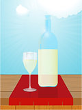 White wine bottle and glass on wood table