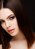 Beauty portrait model with shiny brown hairstyle