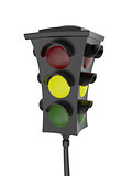 Traffic light with a glowing yellow light