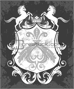 Decorative frame with crown and horses