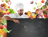 Chef with board and vegetables background