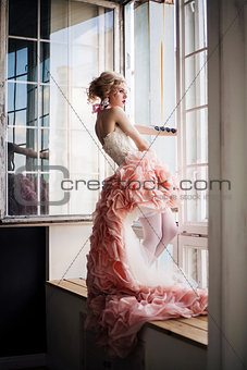 Fashion photo of beautiful girl wearing high and low dress