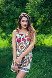 Portrait of beautiful girl wearing trendy outfit. Summer fashion