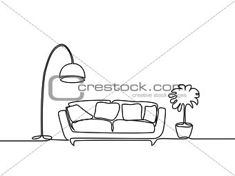 Interior with sofa, floor lamp and plant.