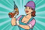 Construction worker with drill. Woman professional