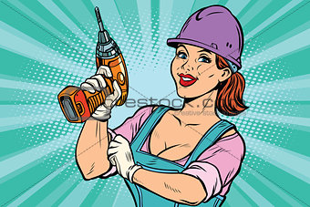 Construction worker with drill. Woman professional