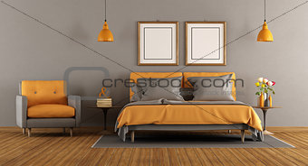 Modern gray and orange bedroom