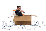 Afraid businessman with cardboard in the ocean