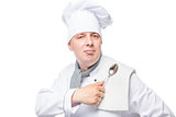 successful chef with a towel and a spoon on a white background