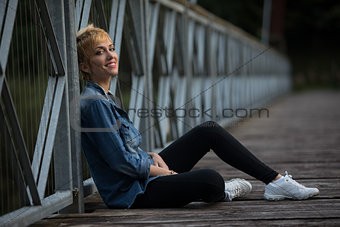 Smiling confident casual young blond woman