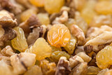 raisins and walnuts closeup background