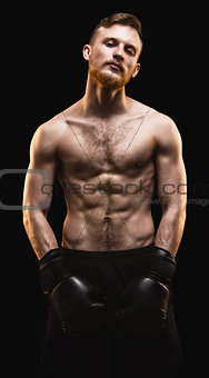 Bearded athlete with boxing gloves