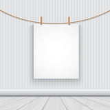 Hanging blank picture in a room