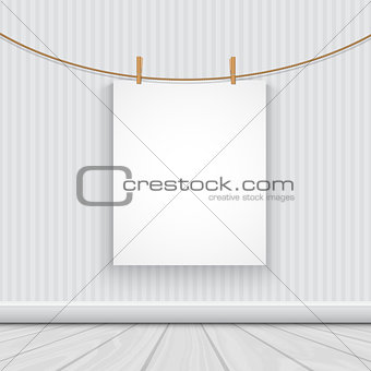Hanging blank picture in a room