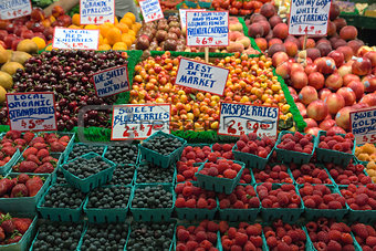 Fresh Fruits and Berries at Fruit Stand in Market
