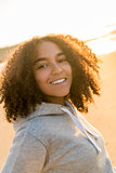 Mixed Race African American Girl Teenager Smiling on Beach at Su