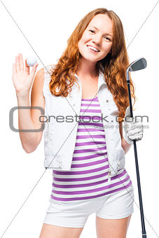 Positive golfer girl posing over white background