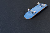 Skateboard on asphalt 