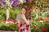 Gardener using tablet
