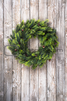 Christmas wreath on wooden door
