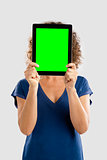 Happy woman holding tablet