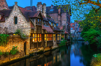 Medieval houses over canal in Bruges Belgium