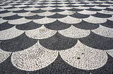 Mosaic tiles pavement pattern in Funchal, Madeira, Portugal. 