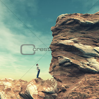 Young man standing on edge 