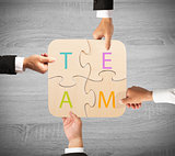 Business teamwork puzzle