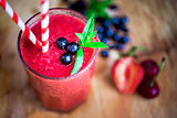 Colorful smoothie and berries