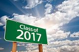 Class of 2017 Green Road Sign with Dramatic Clouds and Sky
